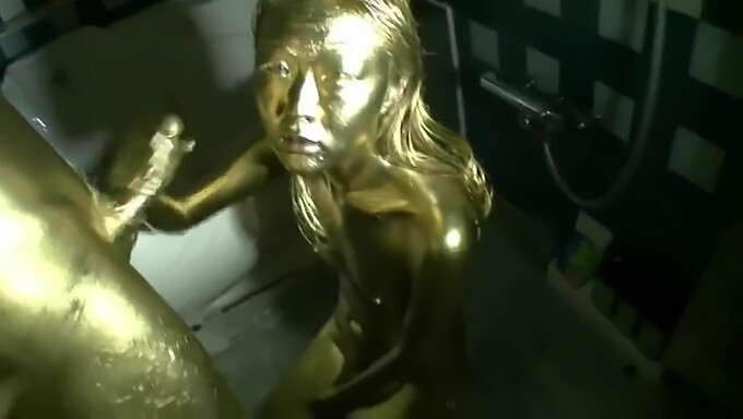 Asian Beauty Gets Painted In Gold For A Steamy Video