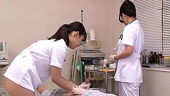 Japanese Nurses Attend To Patients In A Hospital Setting